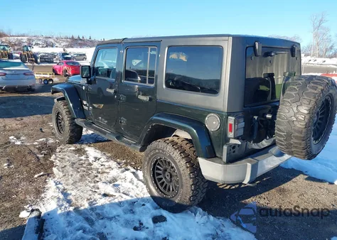 2012 Jeep Wrangler Unlimited Sahara z USA, uszkodzony, nr VIN 1C4BJWEG6CL169912